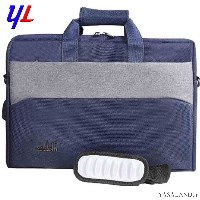 کیف لپتاپ مدل 1120 نوع دستی رنگ سورمه ای با نوار خاکستری